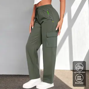 Women’s all-season cargo pants with green letter print, zippered pockets, large patch pockets, drawstring elastic waistband; stylish casual outdoor long pants suitable for jogging outdoors and everyday wear; simple and versatile for daily commuting.