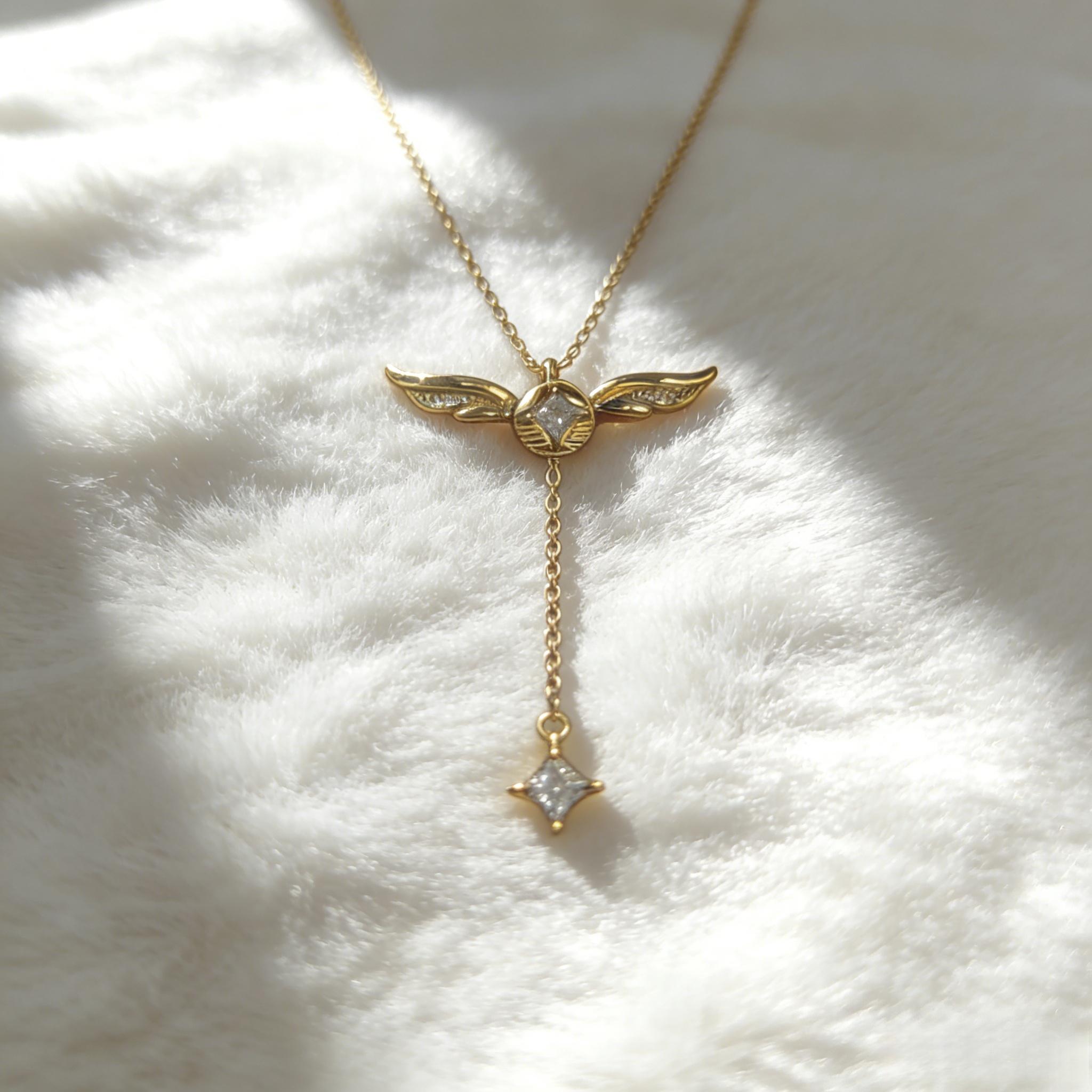 925 Sterling Silver Gold-Plated 18 Inches Adjustable Y-Necklace Adorned with CZ gemstones inlaid on the wings and pendant, this necklace features hypoallergenic & nickel-free properties, Perfect for women’s daily casual wear. 925 Sterling Silver Gold-Plated 18 Inches Adjustable Y-Necklace Adorned with CZ gemstones inlaid on the wings and pendant, this necklace features hypoallergenic & nickel-free properties, Perfect for women’s daily casual wear.