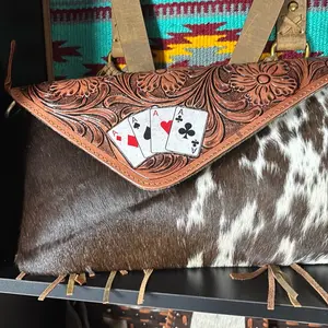 Cowhide with cars design clutch