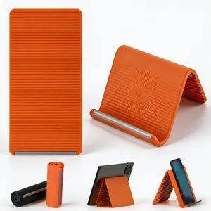 Flexible Silicone Phone Holder, Bendable into Any Shape, Multi-Angle Adjustable for Phone/Tablet/Laptop, Non-Slip Desk Mount, Universal for Home Office Travel, Orange-Black.