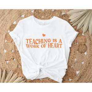 Women's teacher appreciation and education Graphic T-Shirt - Short Sleeve Crew Neck Regular Fit Casual Wear | Soft & Breathable Fabric, Durable Print, Everyday Comfort, Machine Washable, casual and inspirational flat lay with natural elements like woven