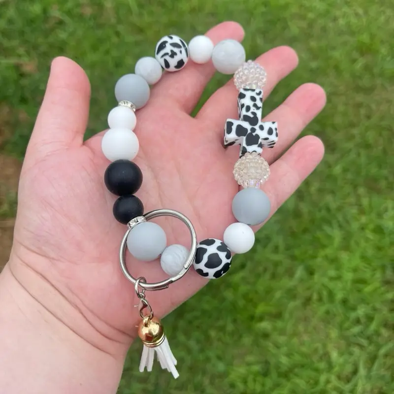 Cow print Cross silicone Beaded Keychain Wristlet with Black White Beads and Gold Tassel Charm