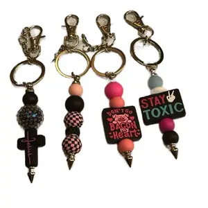 Beaded Post Keychain- Keychains with Assorted Beads, Blue Pom-Poms, and Colorful designs. (Claim on Live) Choking hazard due to small parts and beads.