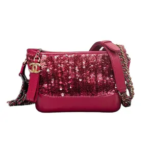 Pre-owned CHANEL . Crossbody Bags Gabrielle small hobo bag in a fuchsia sequined (paillette) and leather Authentic secondhand