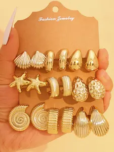 Set of 9 Pairs of Women's Chunky Gold Hoop Earrings, Earring Stacks — Hypoallergenic Stackable Earring Set featuring Thick Open Twisted Hoops, Stylish Gold Starfish, Textured C-Shaped Designs — Perfect for Travel and Vacations