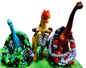 Lost Lands Kandi Pack - 15 pc Dinosaur Rave Bracelets Prehistoric PLUR Headbanger Festival Accessories with Colorful Beads and Unique Designs
