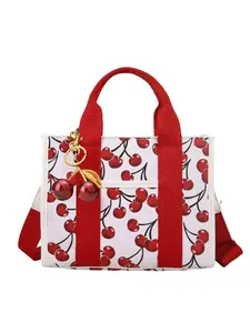 Personalized and trendy exquisite women's crossbody bag shoulder bag, simple and niche, Fashionable patterned bag, cherry patterned women's bag with design sense, with cherry pendant, suitable for daily occasions such as commuting, shopping, parties
