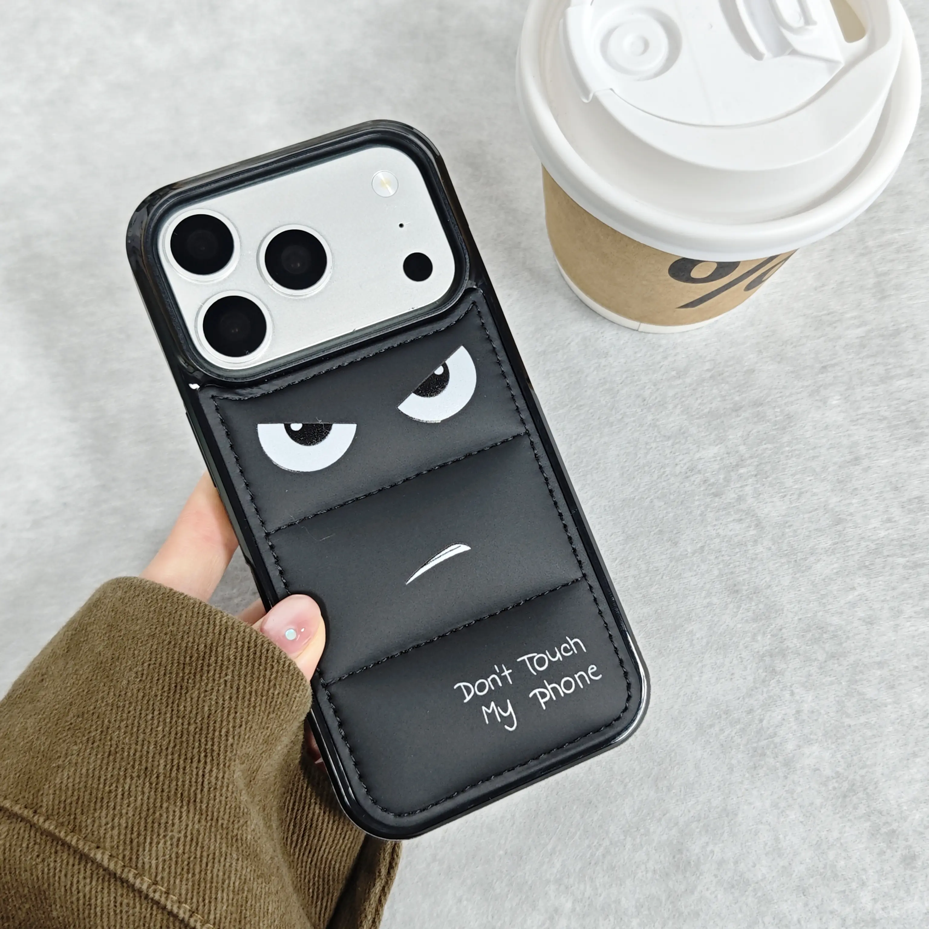 Angry Face Puffer Phone Case with Soft Padding for iPhone 13-17 Pro Max - Black Down Jacket Style, Trendy Quirky Cute Cartoon, Full-Wrap Shockproof Protective Cover, iPhone Series Accessories, Protection