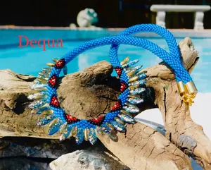 Dequa Gemma Necklace Hand-Strung Crocheted with Teal Seed Beads Gold Leaf & Micro Daggers 17 Inches Gold-Plated End Caps