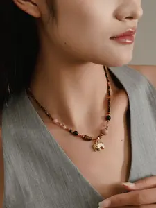 The dreamy design of the Little Island Maillard beaded elephant necklace is a fashionable accessory