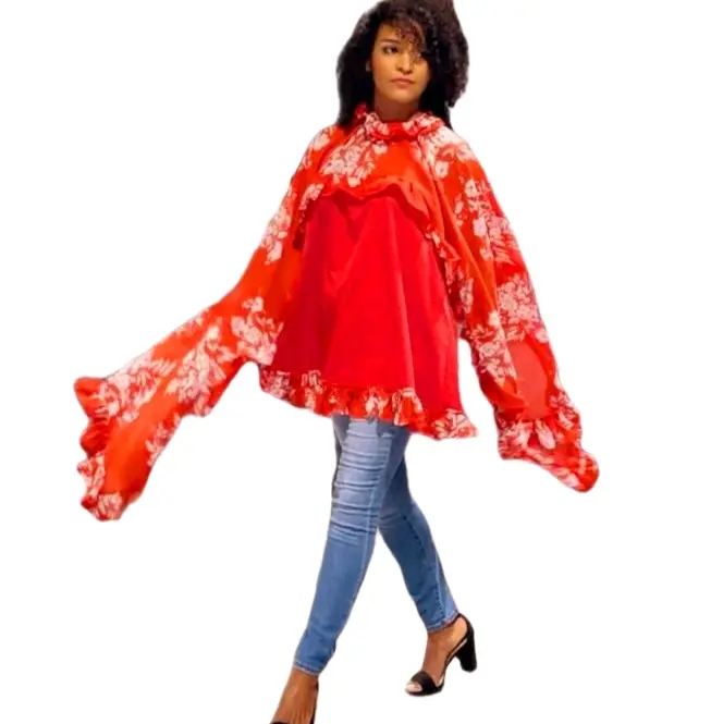 Introducing our Butterfly Top-a unique and playful addition to your wardrobe.  This stunning red top features elegant ruffles that will make you stand out from the crowd.  With this one-of-a-kind design, this top is perfect for adding a touch of fun