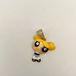 10kPower Girl Charm - Yellow Character with Unique Design and Details Featuring a Sparkling Accessory