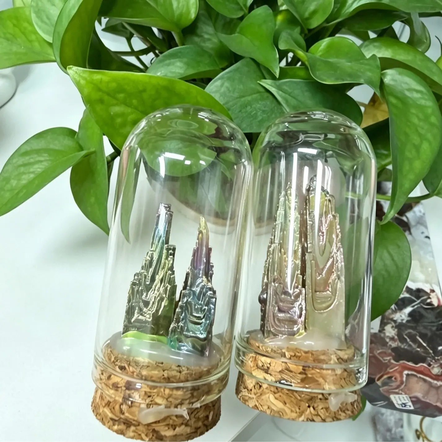 Mia(16272)gc.Mini bismuth crystal tower specimen displayed in glass dome with cork base for crystal collection.$40 get 10pcs.