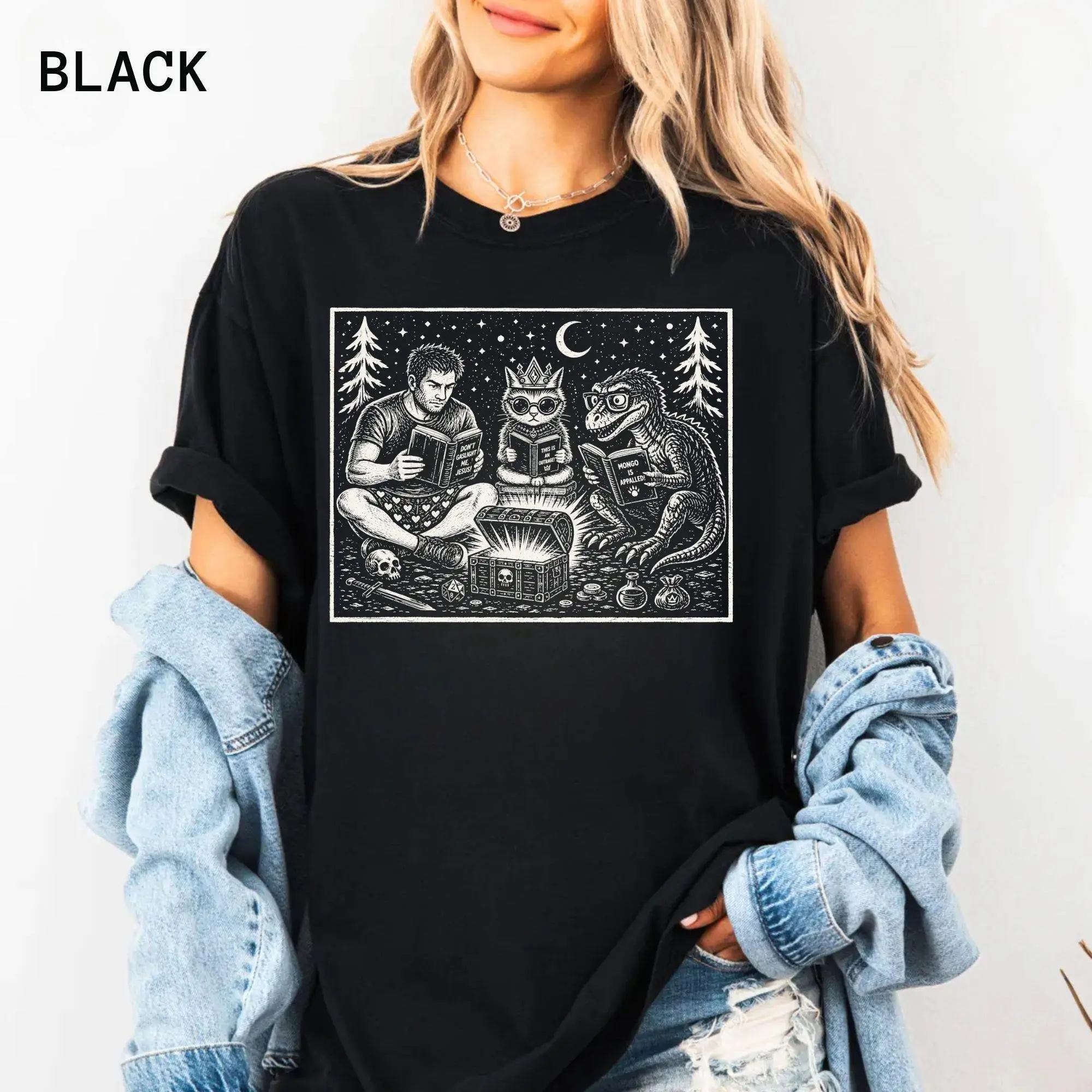 Classic Loose Fit Cotton Crew Neck T Shirt With Retro Woodcut Style Fantasy Scene Of Human Cat And Dinosaur Reading Beside Glowing Treasure Chest Night Sky Forest Art Print Unisex Short Sleeve Everyday Nerdy Tabletop Roleplay Graphic Street Style Tee