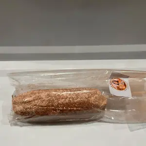 Sobri- elote. White and brown clay in a form of a corn. Made jn Mexico