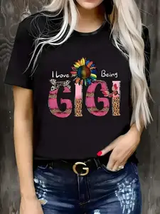 Plus-Size Women's "I Love Being GIGI" Graphic T-Shirt - Vibrant Multicolor Floral & Leopard Print Lettering, Glossy Finish Round Neck Short Sleeve Summer Top, Casual Comfort Fit for Everyday Outfits & Family Gatherings - Machine Washable Trendy Statement