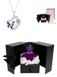 "Hummingbird Rose · True Love"Elegant, fade-resistant luxury hummingbird & rose necklace. Comes with a purple preserved rose bear jewelry box. A mysterious gift ideal for dates, holidays, Valentine’s Day, wives and back-to-school gifting.