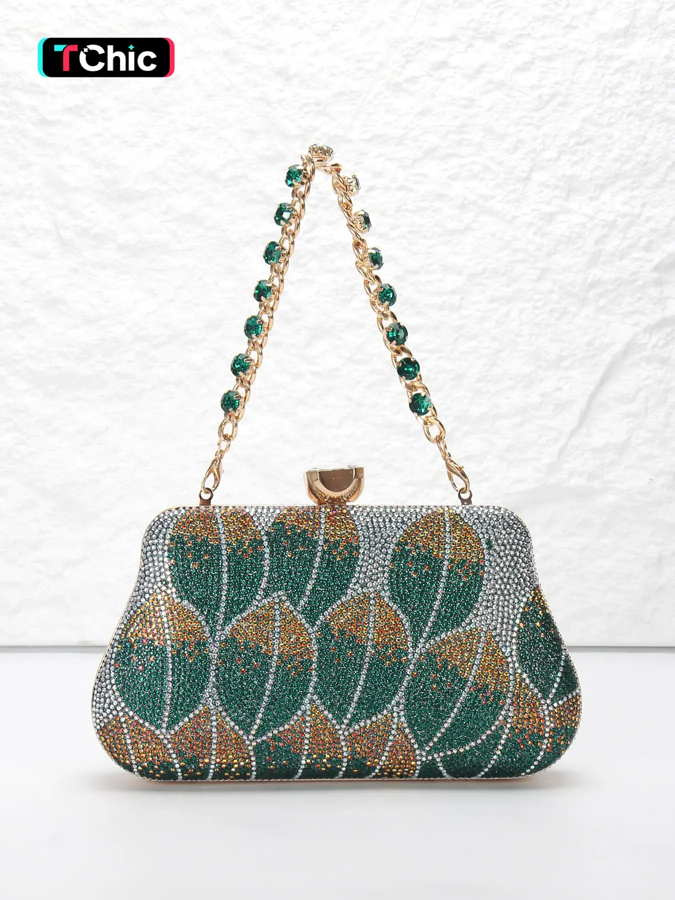 A leaf pattern lady's evening bag, Fashionable, shiny rhinestones with hand chain, clutch bag, crossbody bag with shoulder chain, large rhinestones lock design, diamond studded hand chain design, back to school season, weddings, parties, banquets