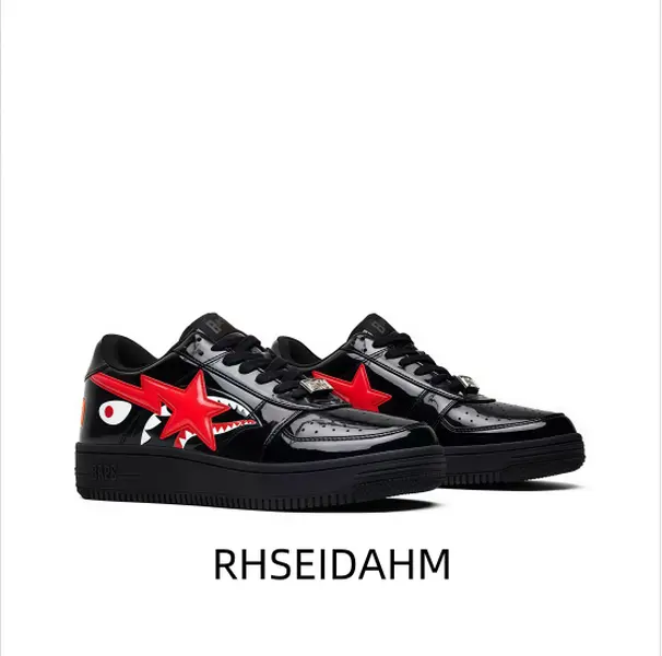 Eye catching black low top athletic shoe, red star design, glossy patent upper, shark mouth accent, black chunky midsole, black outsole, lace up front, designer look