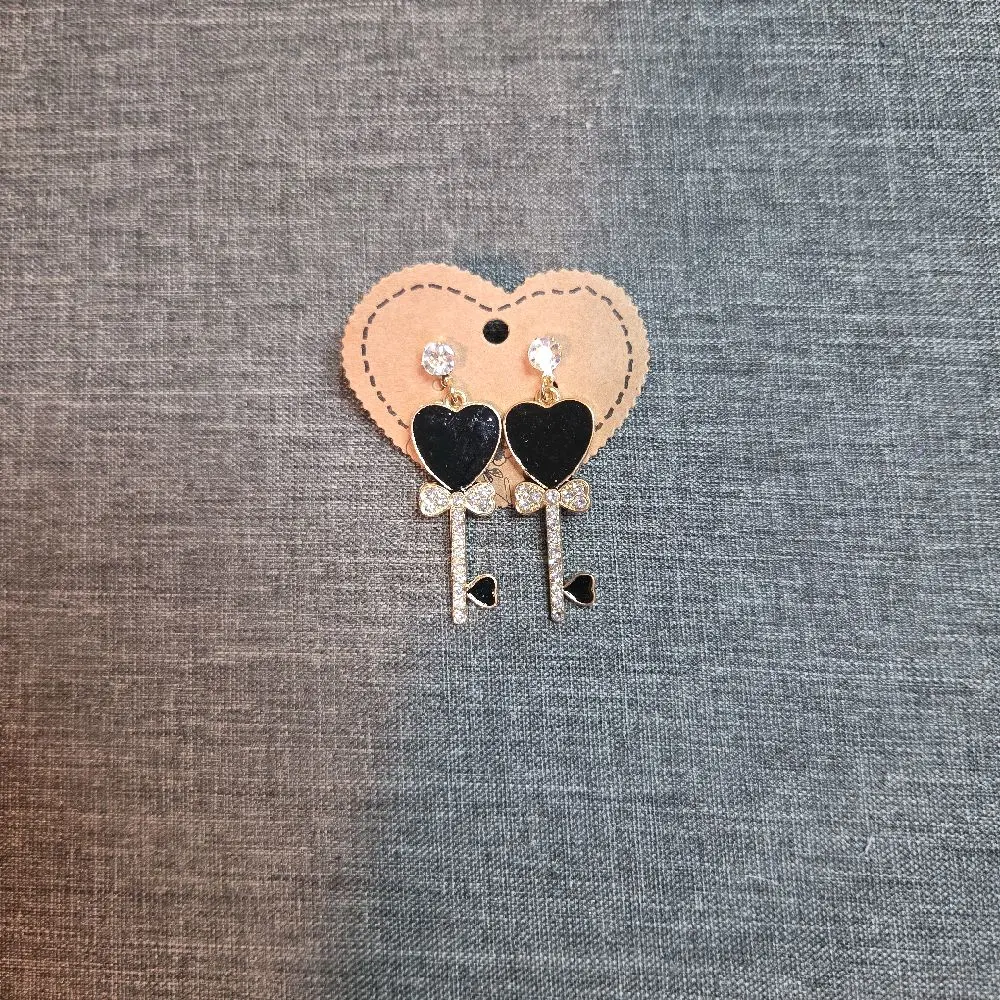 Unisex Elegant Black Heart Stud Earrings with Gold Key Detail - Secure-Fit Costume Jewelry for Casual Wear, No Warning Applicable, Fashion, Bold Statement