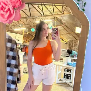 The Velma Bodysuit in Orange Women’s Tops