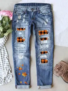 Orange Maple Leaf Patch Print Denim Jeans, Vintage Ripped Design, Cat Whisker Detailing, Elastic Comfort Fabric, Perfect Fit Long Pants for All Seasons