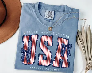 Comfort Colors USA 250th Anniversary T-Shirt , Stars And Stripes Letter Design With Patriotic Bows , America 1776–2026 Celebration Shirt , 4th Of July Outfit , Gift For Patriotic Women