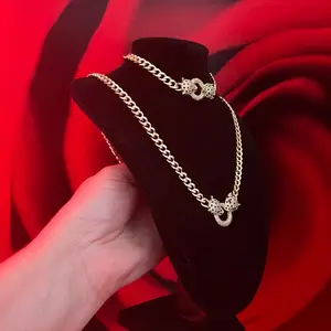 14kl Gold Plated Necklace and Adjustable Bracelet Set with Elegant Chain Design
