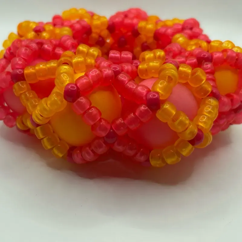 Glow in the Dark Pink and Orange Kandi Cuff bracelet