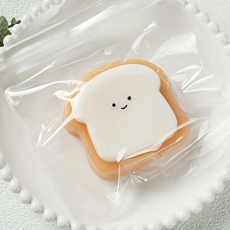 Ultra-Soft Squishy Toast Relax Toy - Cute Bread Slice Design, Slow Rebound, Easy to Clean, Synthetic Rubber, Multicolor