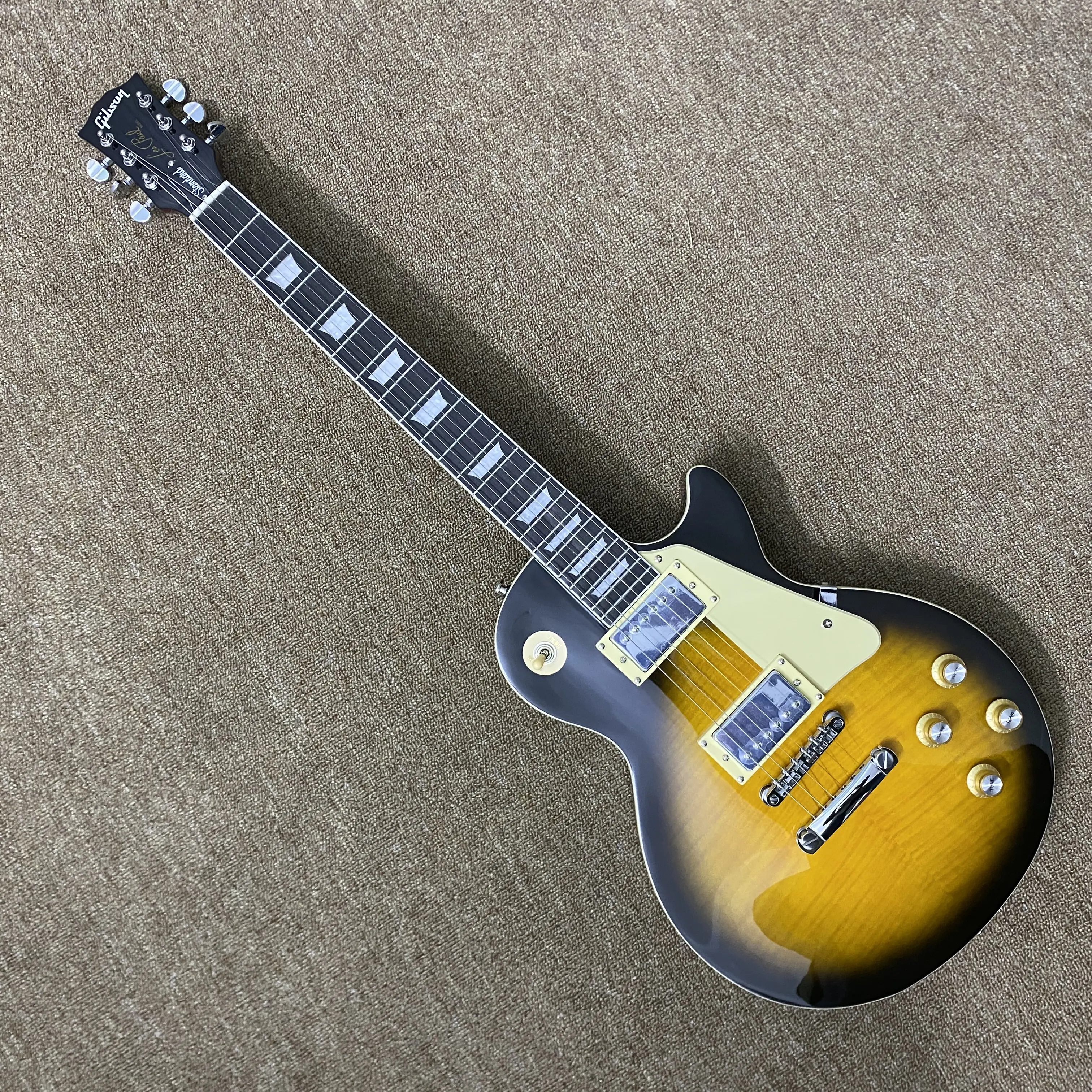 LP electric guitar, yellow mahogany body, chrome hardware, rosewood fretboard, 22 frets