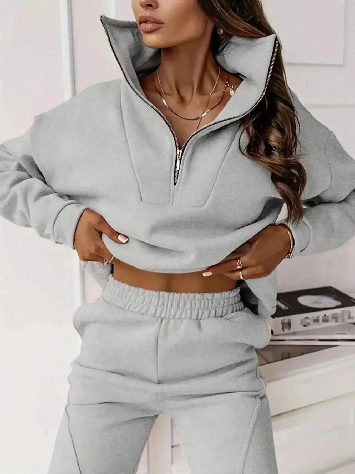 Two-piece women's solid-color crew-neck pullover with long sleeves and elastic waist loose-fitting bottom pants perfect for all occasions versatile in style Outfit casual essential all day comfort essential wardrobe