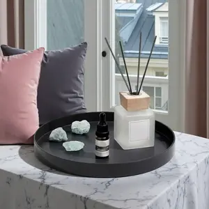 Metal tray with 4 magnetic candle holders enhances festive dining scenes with layered vintage lighting.