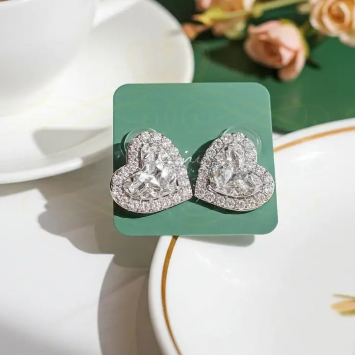 King of Bling's 1.00ct Moissanite White 925 Sterling Silver Women's Heart Shape Nugget Earrings