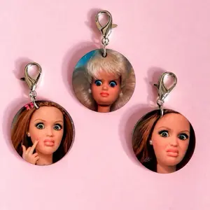 Cringe Doll Face Badge Reel Charm - Fun Character Design for Personalized Accessories
