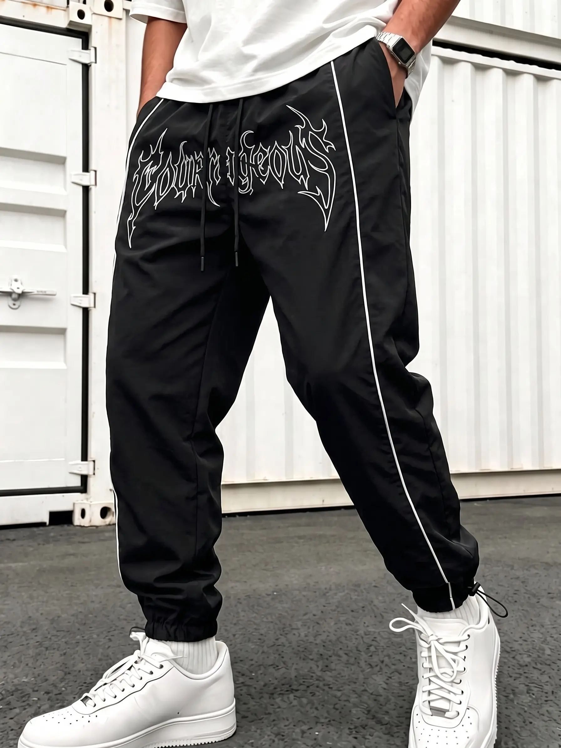 Color-block loose parachute pants with stretch fabric, adjustable waistband, drawstring cuffs—ideal for outdoor travel, fitness, sports, and casual wear.