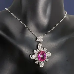Inspired Pink Gemstone Pendant Necklace - Sparkling Cubic Zirconia Statement Piece, Silver Tone Chain, Elegant for Evening/Party