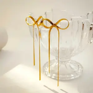 Chic Bow Tassel Earrings - Elegant Gold Tassel Design for Any Occasion - Adds Grace & Style to Outfits - Versatile Jewelry Accessory