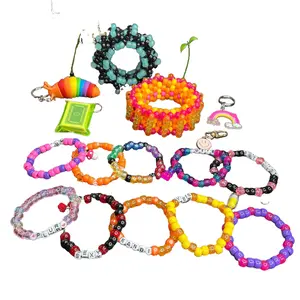 Kandi Festival Starter Pack with 10 Single Bracelets, 2 Cuffs, Glow in the Dark Earrings & 3 Random Keychains - Includes Charms, Patterns, and More