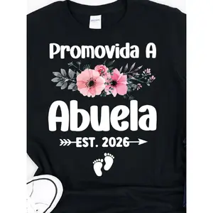 's Funny Grandma 2026 T-Shirt - Spanish "Abuela" Pregnancy Announcement Top with Footprints & Floral Design, Short Sleeve Round Neck Cotton Shirt for New Grandmothers, Grantma Gift, Year Ahead Grandma-to-Be Outfit
