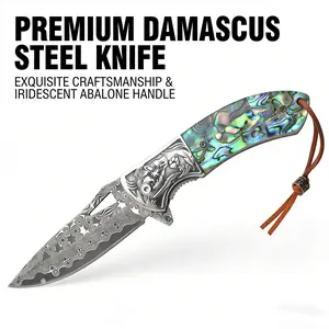A large Damascus folding chef’s knife featuring a wolf head design with Damascus pattern, a clam shell handle, sharp and durable—perfect for everyday carving; an excellent chef’s knife.