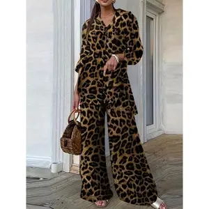 Women’s two-piece set featuring a full leopard-print wide-leg pants and a shirt with a lapel, single-breasted design—a two-piece suit suitable for autumn and winter, with a retro, modern cool style, ideal for parties.