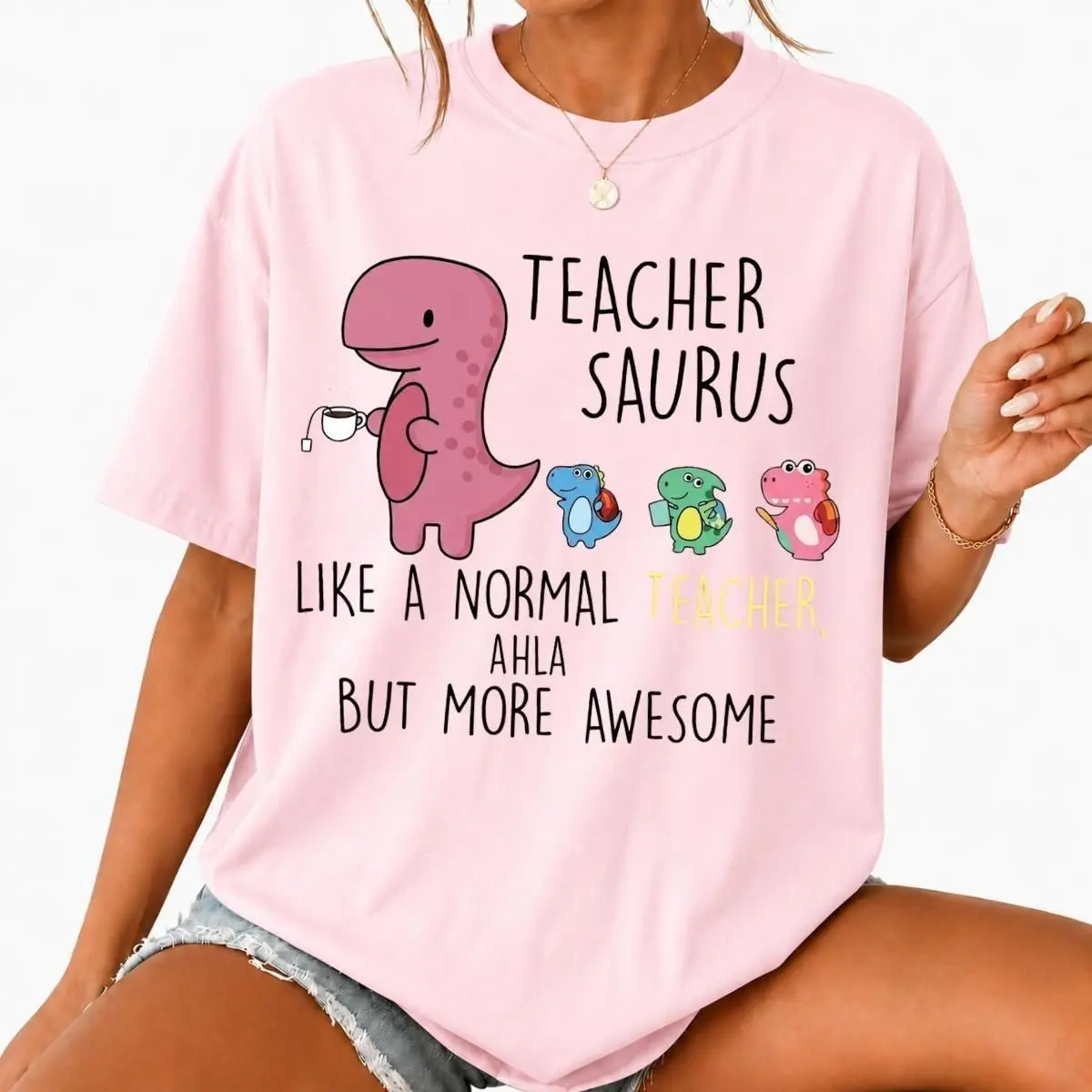 Teacher Saurus Cute Dinosaur Graphic T-Shirt, Funny Back To School Educator Tee, Humorous Teacher Apparel, Front Chest Print Top, Delightful Novelty Gift For Women And Girls Who Love Teaching And School Life