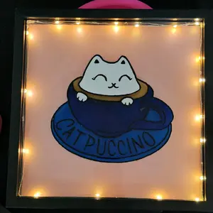 cat-puchino glass art on a shadowbox with lights for hanging on your wall