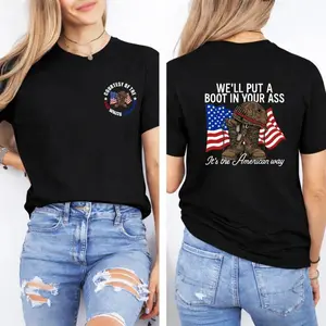 🎉   100% Cotton T - shirt with "WE'LL PUT A BOOT IN YOUR ASS" slogan, American flag & military boot graphic, front "CONTEST OF THE RED WHITE AND BLUE" design