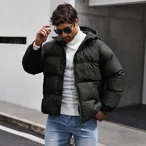 A men's hooded jacket, featuring a casual and versatile style, suitable for winter wear. The hooded design adds a casual touch to the overall look. The garment has a loose fit, making it ideal for those who prefer a casual and versatile style. Suitable fo