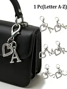 Hollow heart-shaped rhinestone keychain, with letters A-Z, equipped with a lobster clasp, heart, and letter pendants. Suitable for various shoes, bags, and backpack charms, car keychains, creative keychains, and holiday party gifts.