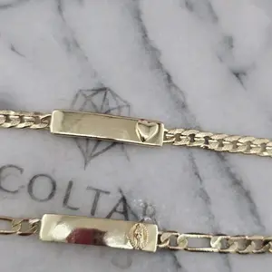 (154)(179) 14K GoldLaminated  bracelet,   styles available heart / cuban &   virgin /figaro    esclava 7.5  inches.   women  We engrave