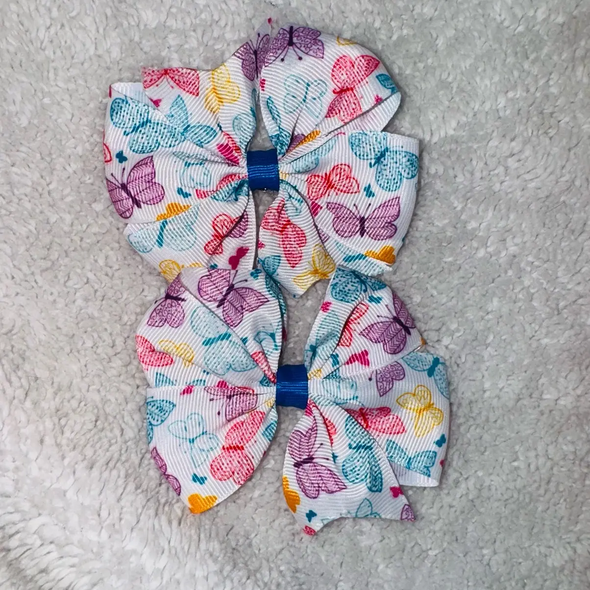 Colorful butterfly patterned bows