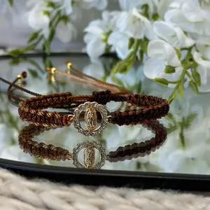 Handcrafted Circular Virgin Mary Pendant Bracelet with Brown Cord and Simple Design